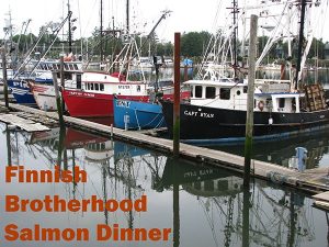 Row of fishing boats anchored in harbor text: Finnish Brotherhoold Salmon Dinner